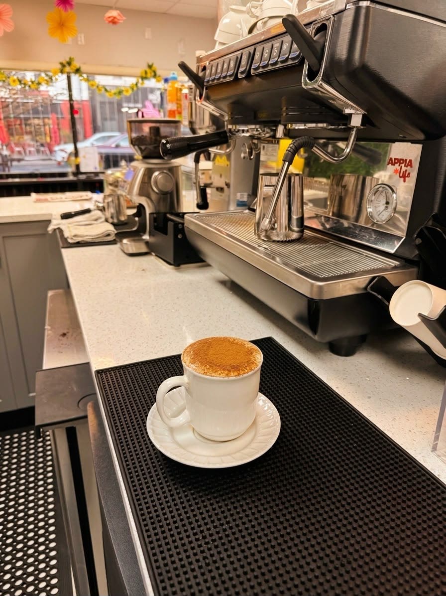 A fresh cappuccino at the espresso machine in JJ's Café