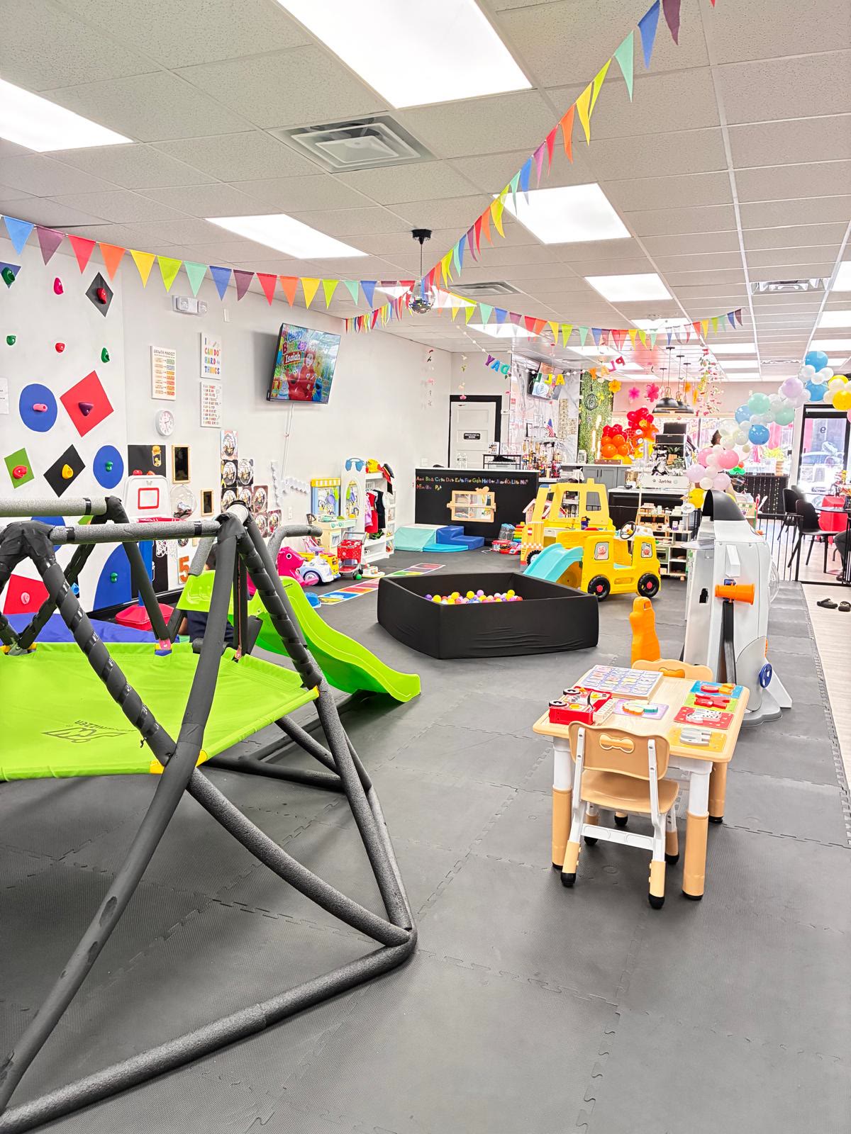 Ball pit and play area with party bunting at JJ's